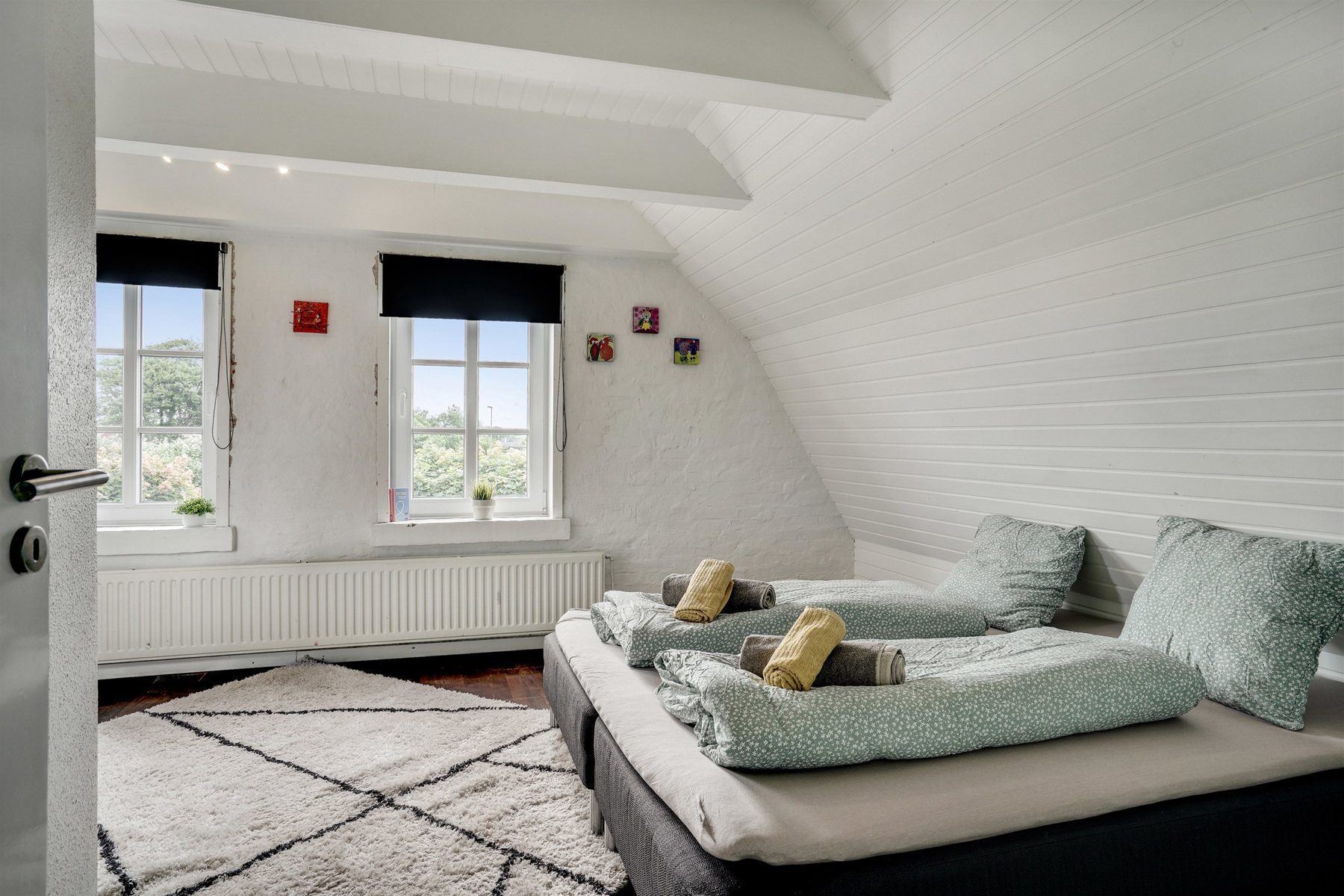 Room 1 – double room with wooden details